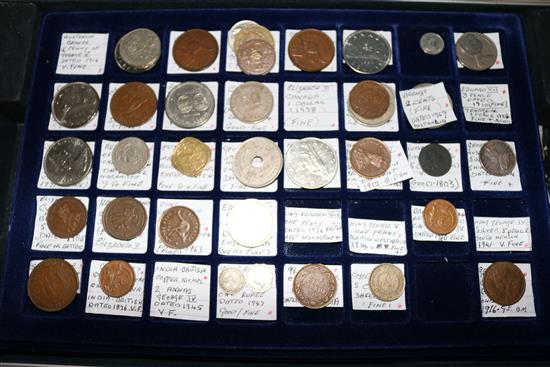 A case of UK and World coins, 6 trays